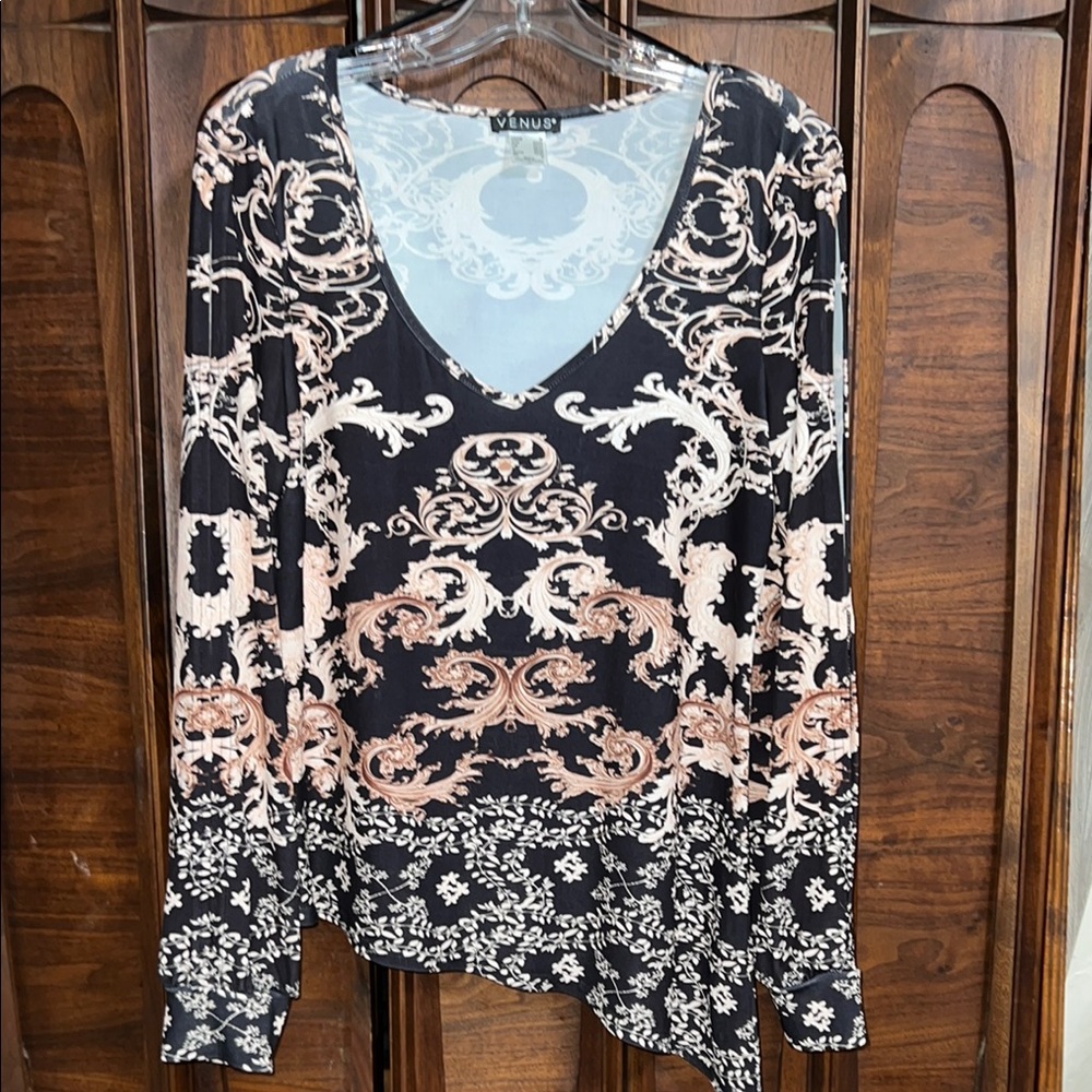 VENUS Black and White Asymmetrical Long Sleeve Blouse with slits in the sleeves.